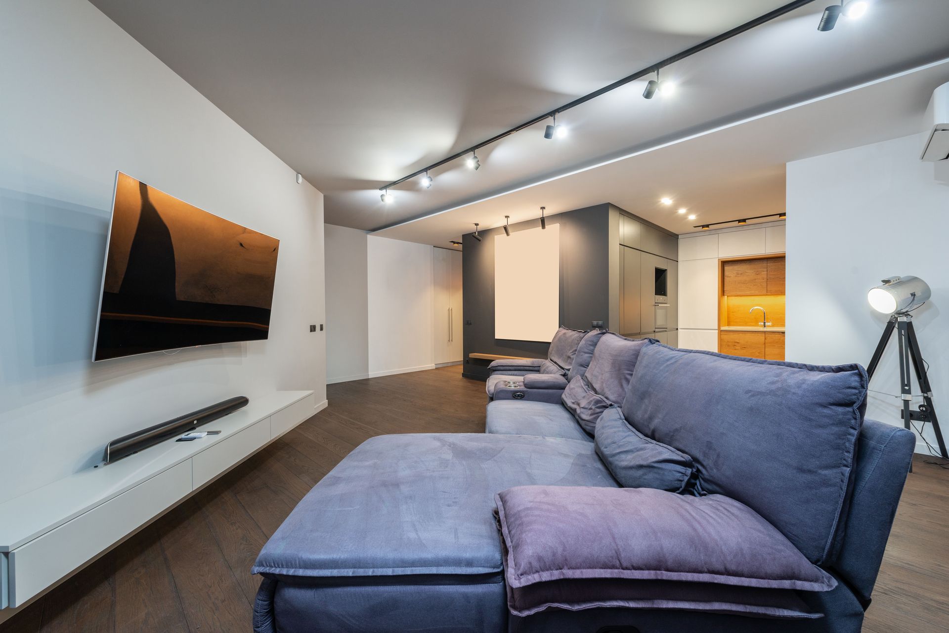 Spacious and stylish living room featuring modern furniture and minimalist design.